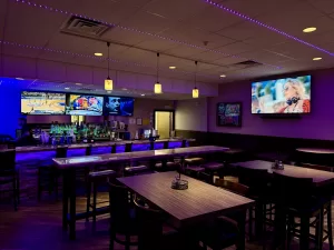Bowling Specials & Deals | Strikers Bar & Lounge Stylish sports bar and lounge at Strikers Bowling, featuring high-top tables, a full bar, and Bowling Specials & Deals in Sunrise, FL.