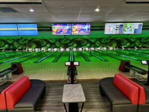 Bowling Specials & Deals | Strikers Bowling Lanes & Offers Strikers Bowling lanes with neon lighting, digital scoreboards, and exclusive Bowling Specials & Deals for walk-in packages and group offers in Sunrise, FL.